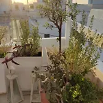 Hébergement de vacances White Cycladic Town House With Sea Vew